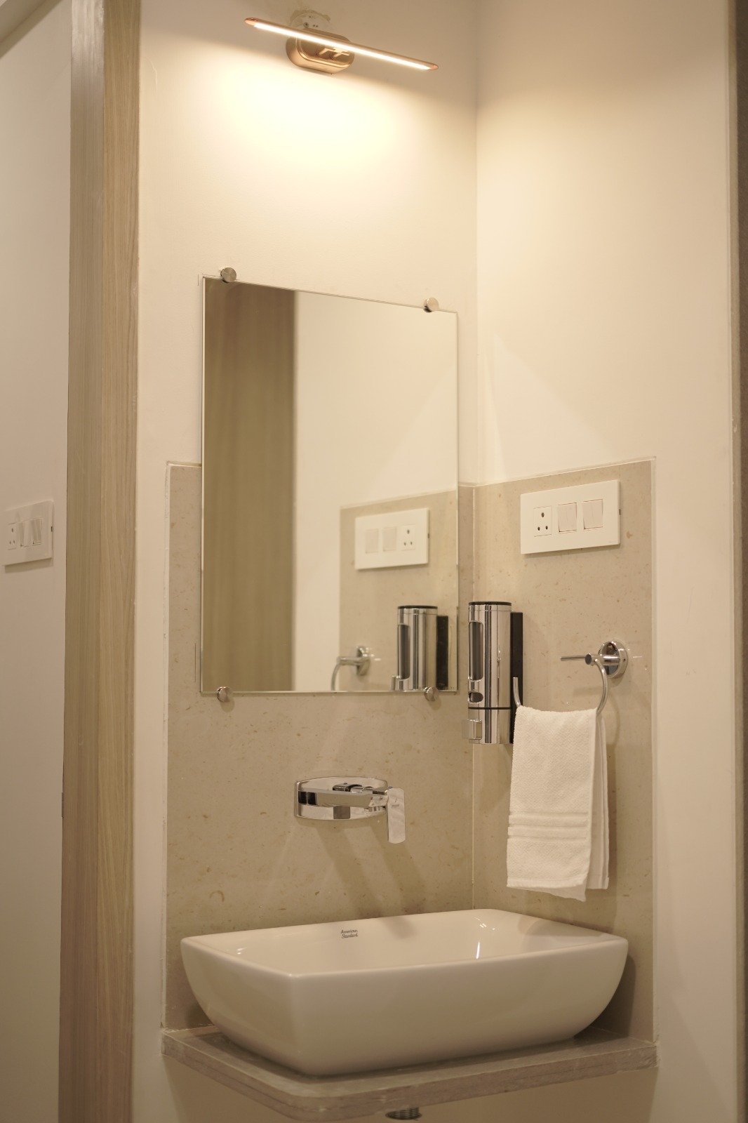 Bathroom vanity and guest amenities at SVP Corporates